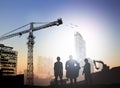 Silhouette engineer in a building site over Blurred constructio Royalty Free Stock Photo
