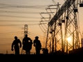 Silhouette of engineer looking at blueprints in a building site Royalty Free Stock Photo