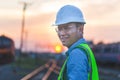 Silhouette of Engineer man in waistcoats and hardhats in construction site Royalty Free Stock Photo