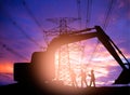 Silhouette engineer working in a building site over Blurred co Royalty Free Stock Photo