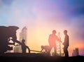 Silhouette engineer working in a building site over Blurred con Royalty Free Stock Photo