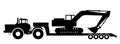 Silhouette of an excavator on a tractor trawl. Royalty Free Stock Photo
