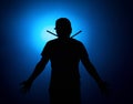 Silhouette Expressive young drummer with drum stick on a blue background Royalty Free Stock Photo