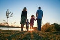 silhouette family, including his father, mother and two children in the hands of Royalty Free Stock Photo