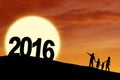 Silhouette family with numbers 2016 at hill Royalty Free Stock Photo