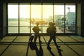 Silhouette of family with Suitcase walking at airport, Man carry