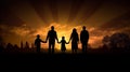 Silhouette of family at sunset