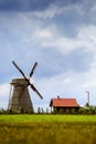 Silhouette of a farm , house and windmill. Royalty Free Stock Photo