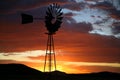 Silhouette of Farm Windmill at Sunset
