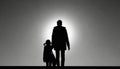 Silhouette of father and child walking together holding hands
