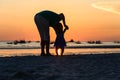 Silhouette of father and little daughter on sunset Royalty Free Stock Photo