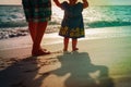 Silhouette of father and little daughter walk at sunset Royalty Free Stock Photo