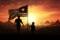 Silhouette of a father and son against the background of the sunset and the flag of the Republic of the Marshall Islands, Royalty Free Stock Photo