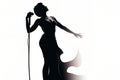 Silhouette of a female diva vocalist singing with a microphone