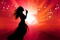 Silhouette of a female diva vocalist singing with a microphone