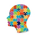 Silhouette of female head with multicolored puzzle pieces. Education, knowledge, psychology, memory, logic concept