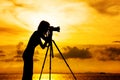 Silhouette female photographer Royalty Free Stock Photo