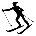 Silhouette of a female skier, black isolated vector object on white background Royalty Free Stock Photo