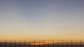 Silhouette fence in twilight time