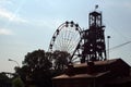 Silhouette of a ferris wheel and old mine head Royalty Free Stock Photo