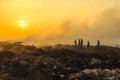 Silhouette Firefighters extinguishing a fire