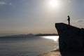 Silhouette of fisheman with fishing-rod in afternoon light