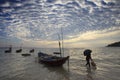 Silhouette of fisher man and beautiful cloud scape