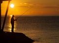 Silhouette of a fisherman