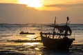 Silhouette fisherman boat on beach at sunset, Chonburi Royalty Free Stock Photo