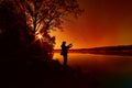 Silhouette of a fisherman Royalty Free Stock Photo