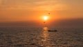 Silhouette fisherman and flying birds at sunset, Bang Pu Royalty Free Stock Photo