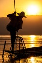 Silhouette fisherman at Inle Lake, Myanmar