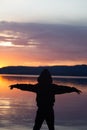 Sonnenuntergang am See , Silhouette of a fisherman on the shore of the lake at sunset Royalty Free Stock Photo