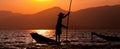 Silhouette of fisherman at sunset Inle Lake