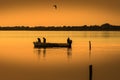 Silhouette of fisherman with sunset Royalty Free Stock Photo