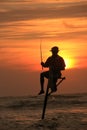 Silhouette of a fisherman at sunset, Unawatuna, Sri Lanka Royalty Free Stock Photo