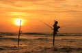 Silhouette of a fisherman at sunset, Unawatuna, Sri Lanka Royalty Free Stock Photo