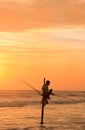 Silhouette of a fisherman at sunset, Unawatuna, Sri Lanka Royalty Free Stock Photo