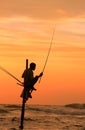 Silhouette of fisherman at sunset, Unawatuna, Sri Lanka Royalty Free Stock Photo