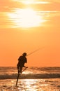 Silhouette of fisherman at sunset, Unawatuna, Sri Lanka Royalty Free Stock Photo