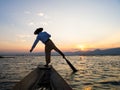 Silhouette fishermen in Inle Lake at sunrise, Shan State, Myanmar