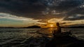 Silhouette of fishermen sailing boat at Ko Chang Island Ranong Province Thailand Royalty Free Stock Photo