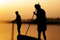 Silhouette of fishermen