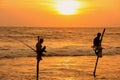 Silhouette of fishermen at sunset, Unawatuna, Sri Lanka
