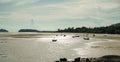 Silhouette of Fishing boat on a calm sea in sunlight. Sunset over the landscape and fishermen\'s boats in Thailand Royalty Free Stock Photo