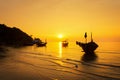 Silhouette fishing boat on the water sea at sunset Royalty Free Stock Photo