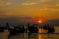 Silhouette of fishing boats at sunset on sea beach resort in Thailand, Krabi Royalty Free Stock Photo