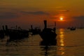 Silhouette of fishing boats sunset on sea beach resort in Thailand, Krabi, Railey and Tonsai Royalty Free Stock Photo