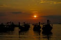 Silhouette of fishing boats sunset on sea beach resort in Thailand, Krabi, Railey and Tonsai Royalty Free Stock Photo