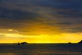 The silhouette of a fishing boats, the sunset sea beautiful colors Royalty Free Stock Photo